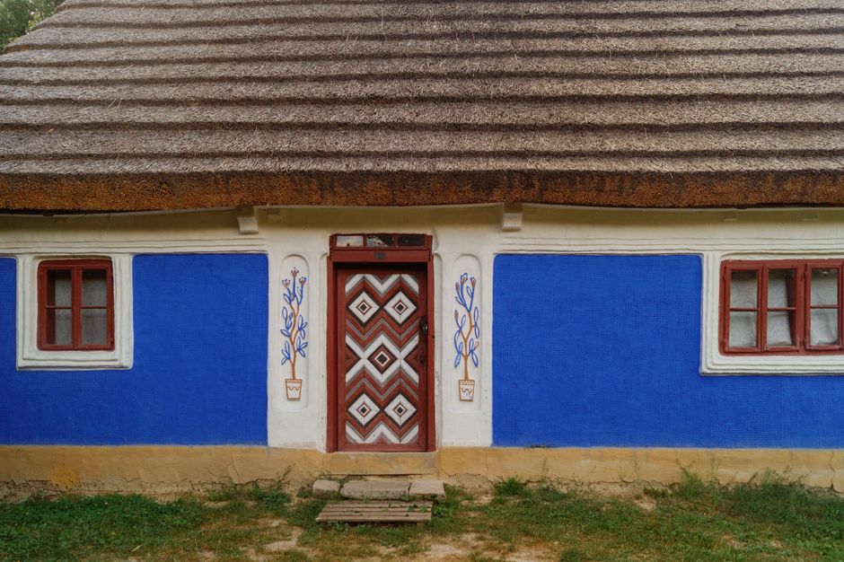 A house exterior with painted blue walls.